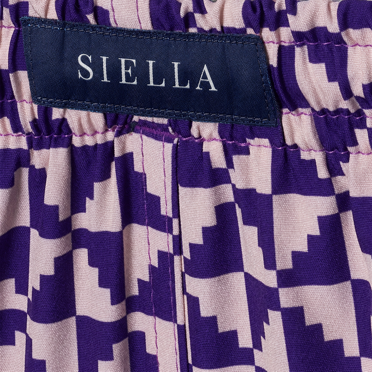 Lila Puzzle-Badeshorts